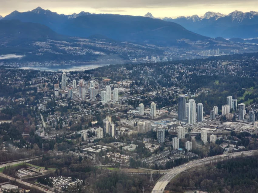 This is an aerial photo of any area with lots of Coquitlam presale condos taken by Mike Stewart Realtor for Vancouver New Condos on December 13, 2023 - We can help with all new developments Coquitlam offers. 