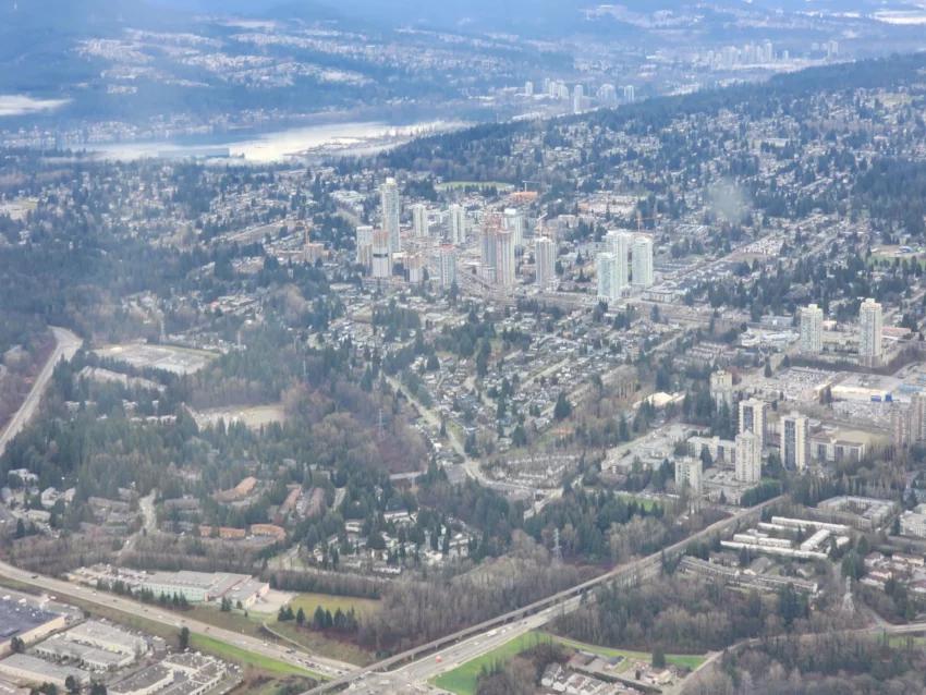 This is an exclusive 2024 aerial photo of Burquitlam from Vancouver New Condos of Coquitlam New Condos as well as existing buildings